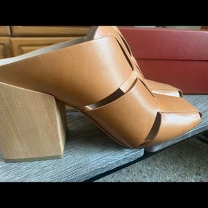 Donald J. Pliner Lilia mule slider with heel.